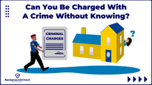 A police officer wearing a blue shirt, black tie, and who has a yellow badge is holding a grey criminal charges citation and on the right is a yellow two story house with a blue roof and a lady sticking her head out the window asking herself "Can you be charged with a crime without knowing?".